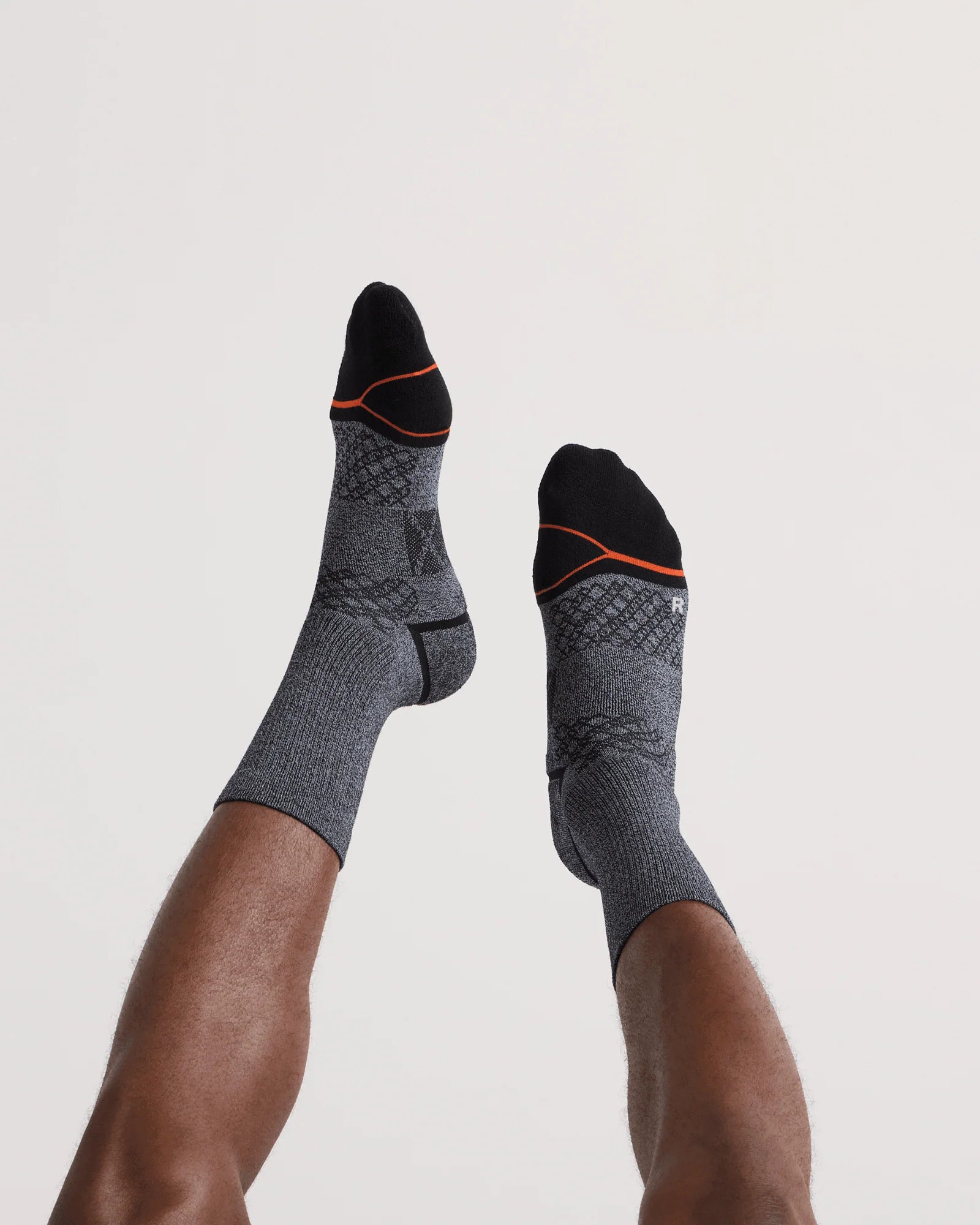 Pair of Black and White Foot Hold Stockings